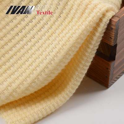 Popular yellow plain dyed fleece jacquard knitted polyester rayon nylon fabric for women sweater